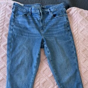 Like new American Eagle super stretch super high rise light blue jeans 16